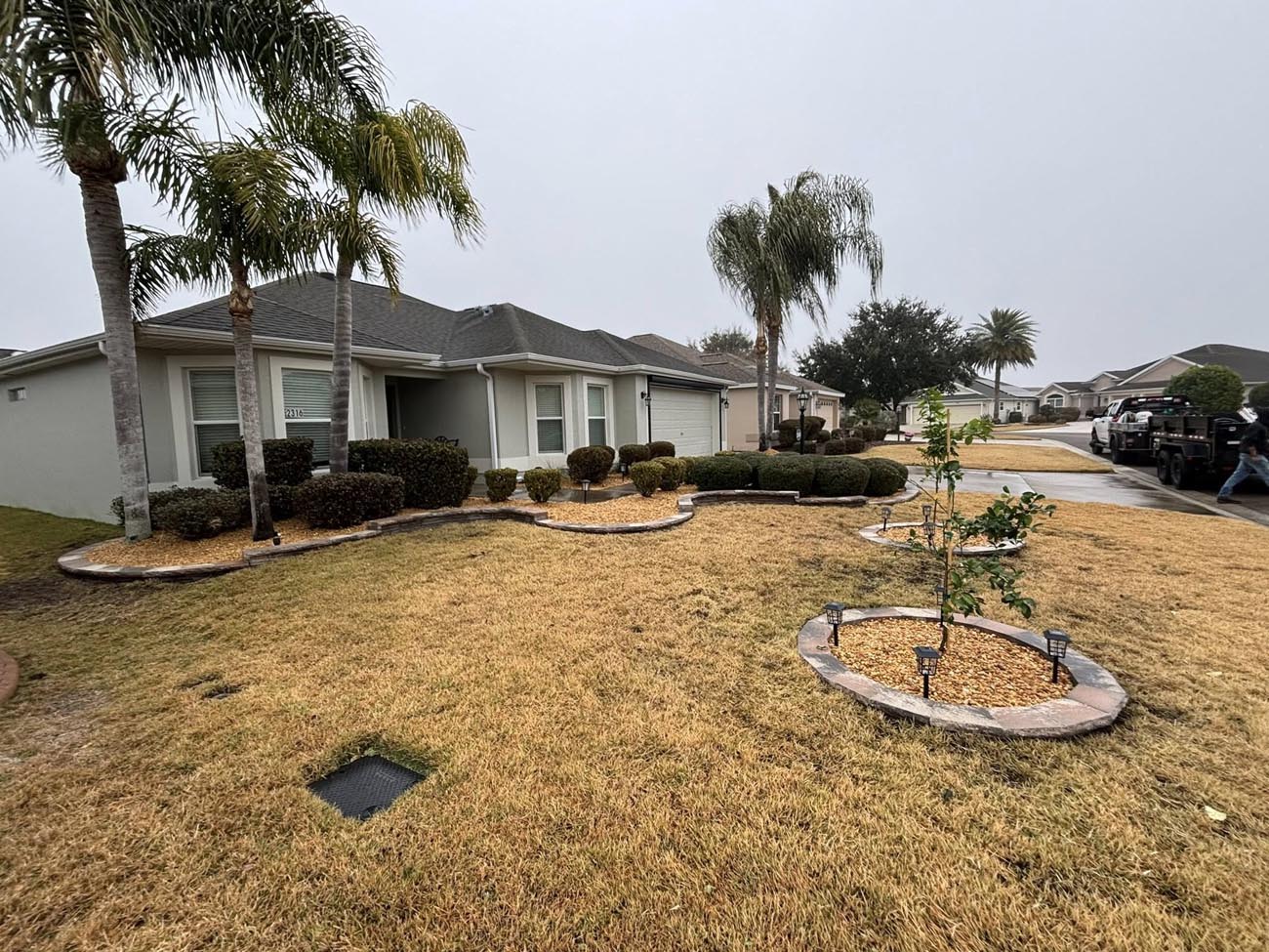 Seasonal flower bed installation adding color to front yard