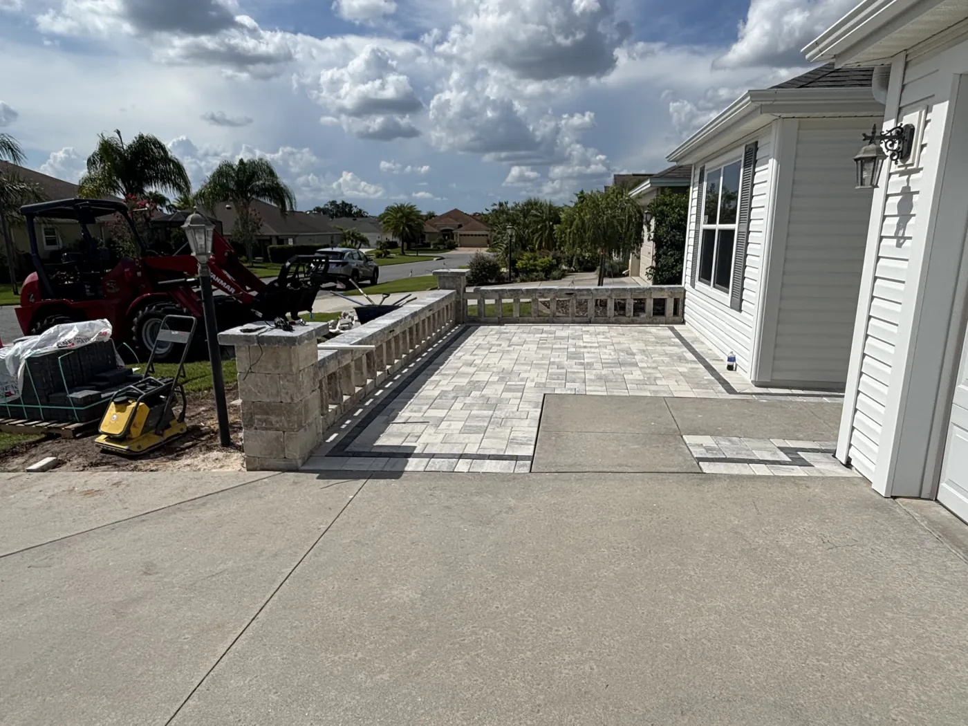Paver patio with wall