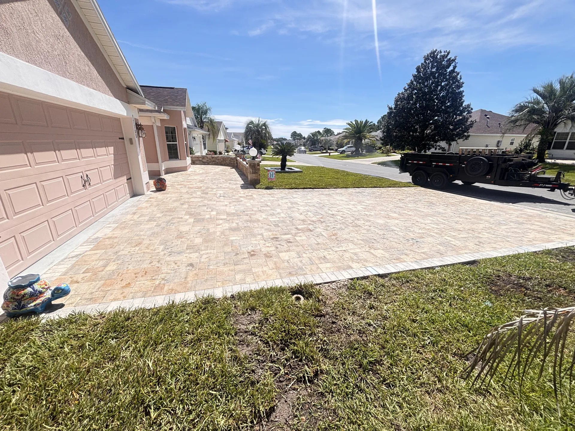 Paver driveway with clean edging in Summerfield, FL